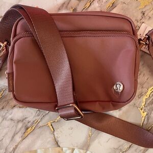 NWT lululemon dusty rose colored belt bag with rose-gold hardware